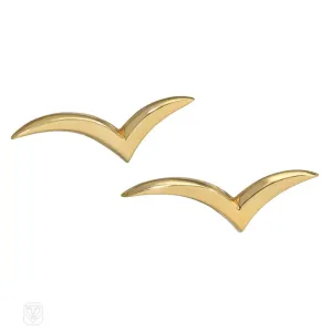 Pair of Tiffany gold stylized bird brooches